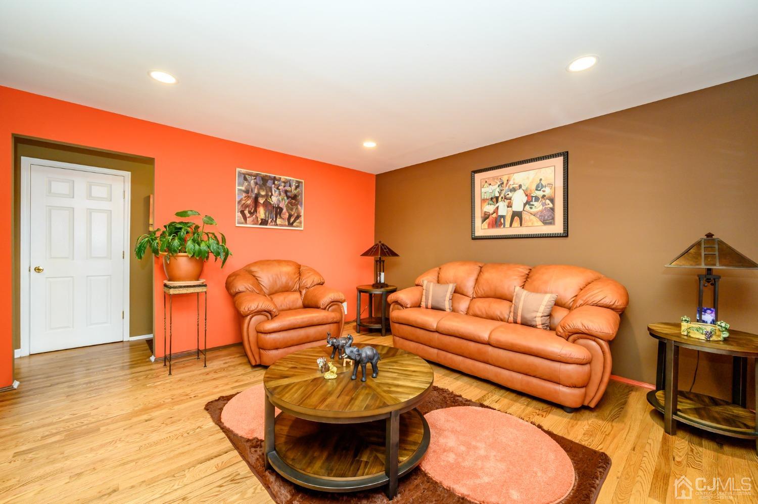 1 Rutgers Drive Howell, NJ 07731 - Photo 5 of 43 a living room with furniture and a wooden floor