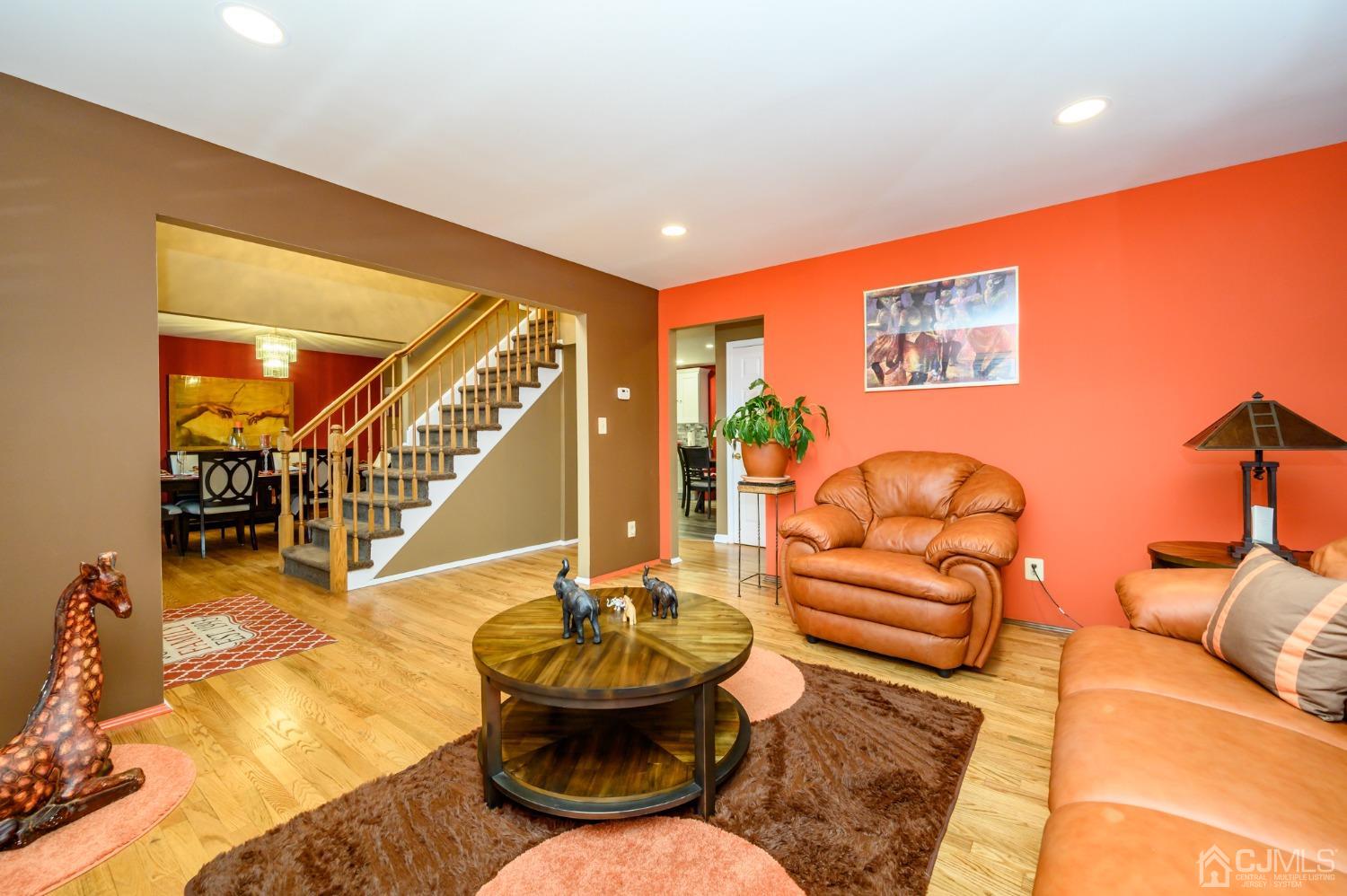 1 Rutgers Drive Howell, NJ 07731 - Photo 6 of 43 a living room with furniture and a wooden floor