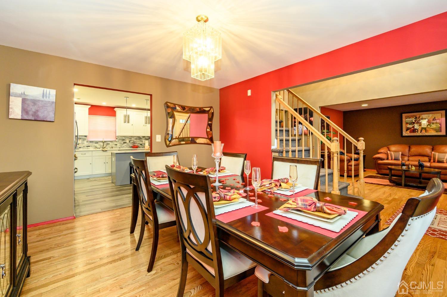 1 Rutgers Drive Howell, NJ 07731 - Photo 8 of 43 a dining room with furniture and wooden floor