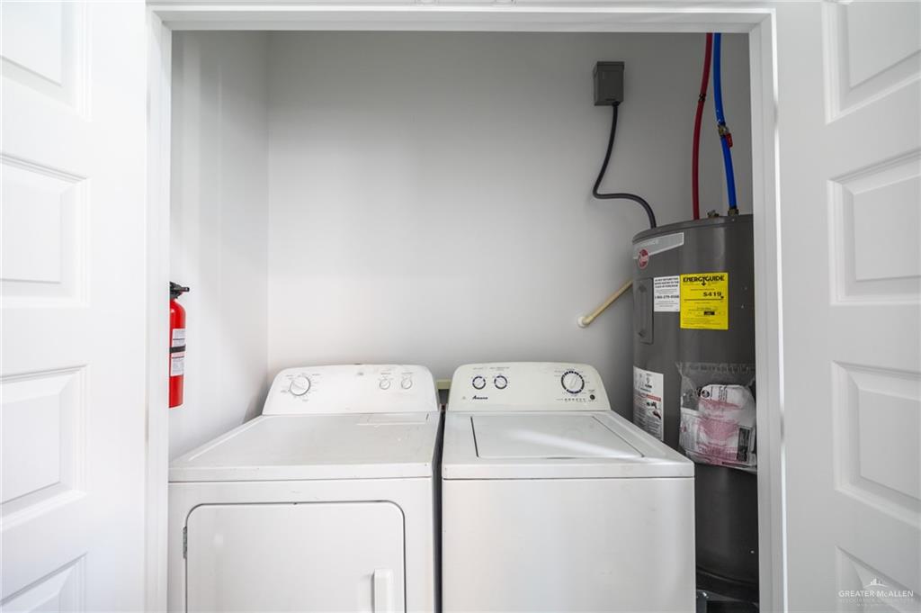 1106 Copper Avenue, Unit 4 San Juan, TX 78589 - Photo 15 of 20 a utility room with dryer and washer
