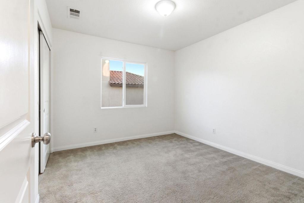 1508 Carpinteria Street Chula Vista, CA 91913 - Photo 31 of 39 an empty room with a window