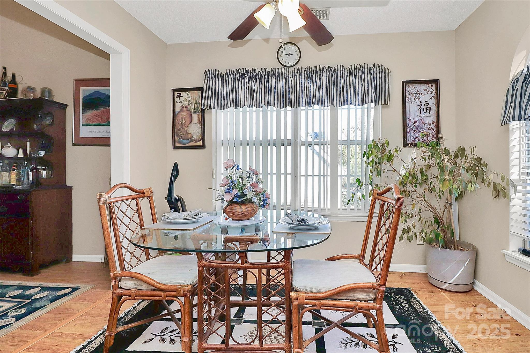 493 Debra Circle Southwest Concord, NC 28025 - Photo 14 of 27 a view of a dining room with furniture window and wooden floor
