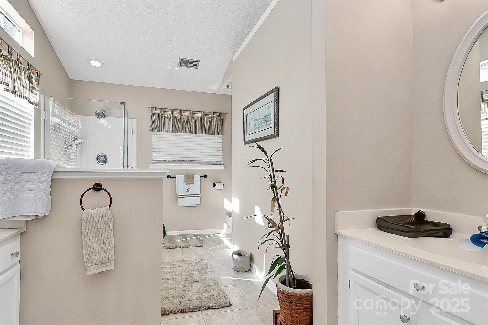 493 Debra Circle Southwest Concord, NC 28025 - Photo 16 of 27 a kitchen with refrigerator and cabinets