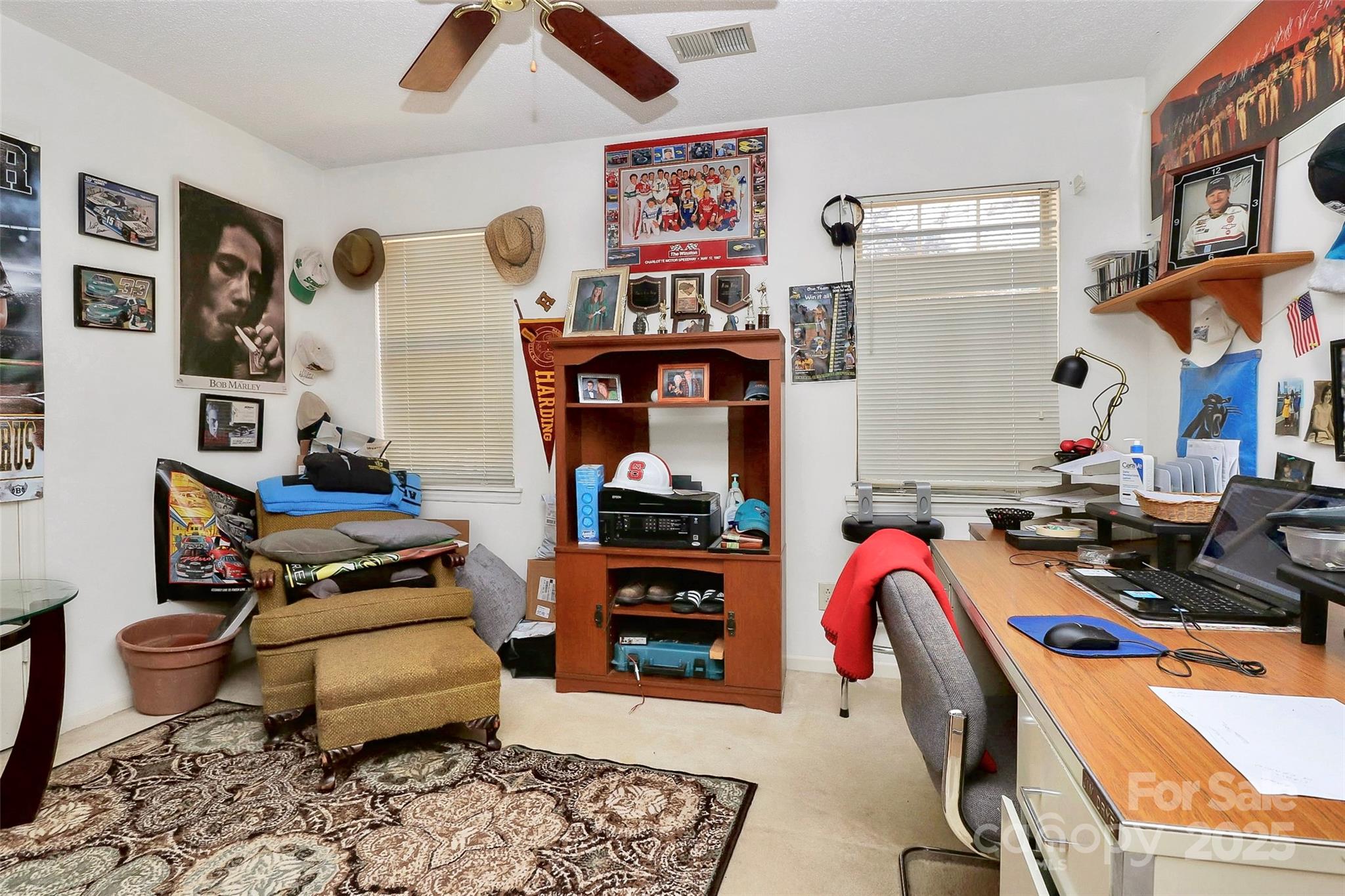493 Debra Circle Southwest Concord, NC 28025 - Photo 19 of 27 a bedroom with bed and cabinets