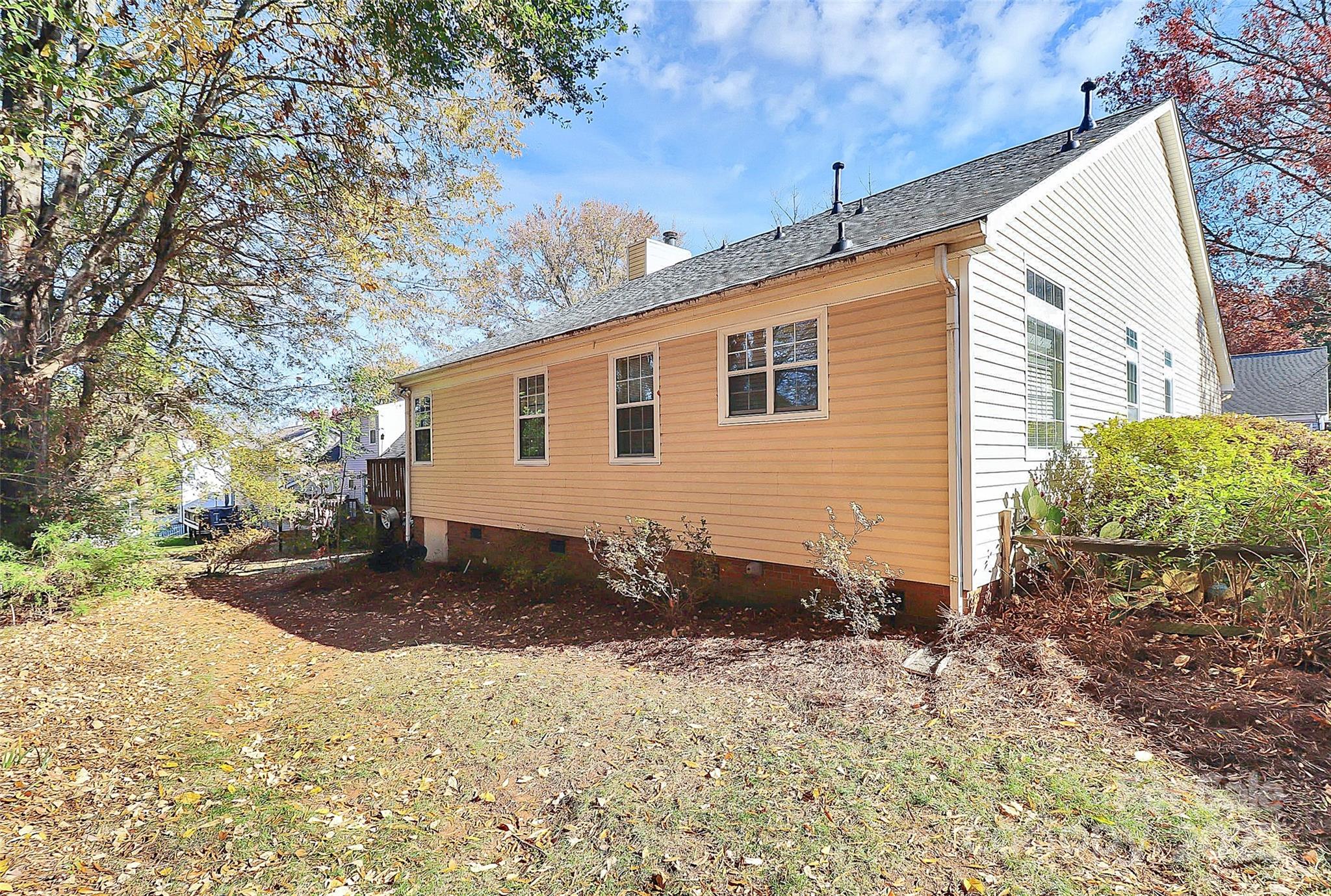 493 Debra Circle Southwest Concord, NC 28025 - Photo 26 of 27 a view of a house with a yard