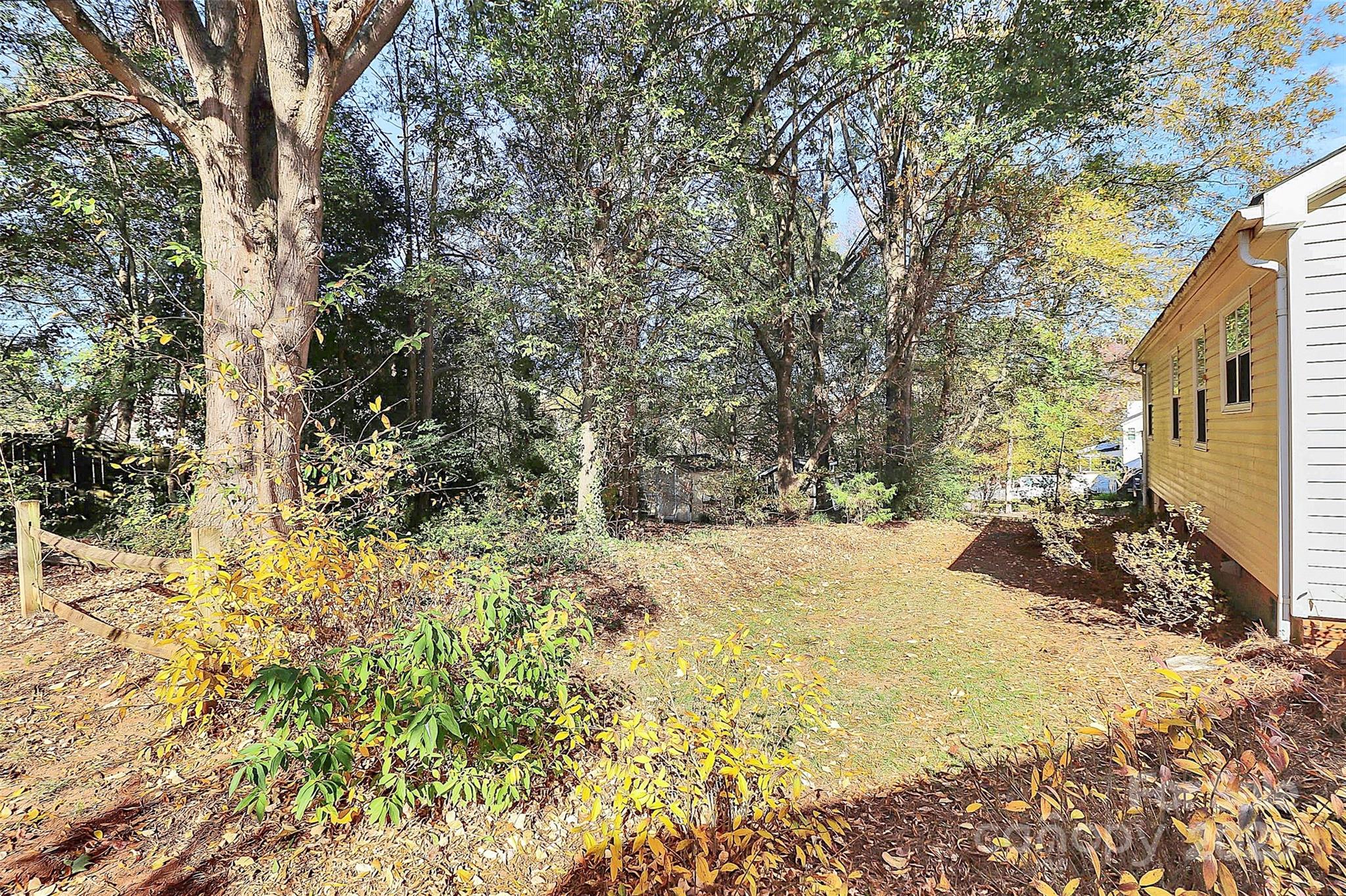493 Debra Circle Southwest Concord, NC 28025 - Photo 27 of 27 a view of a yard with large trees
