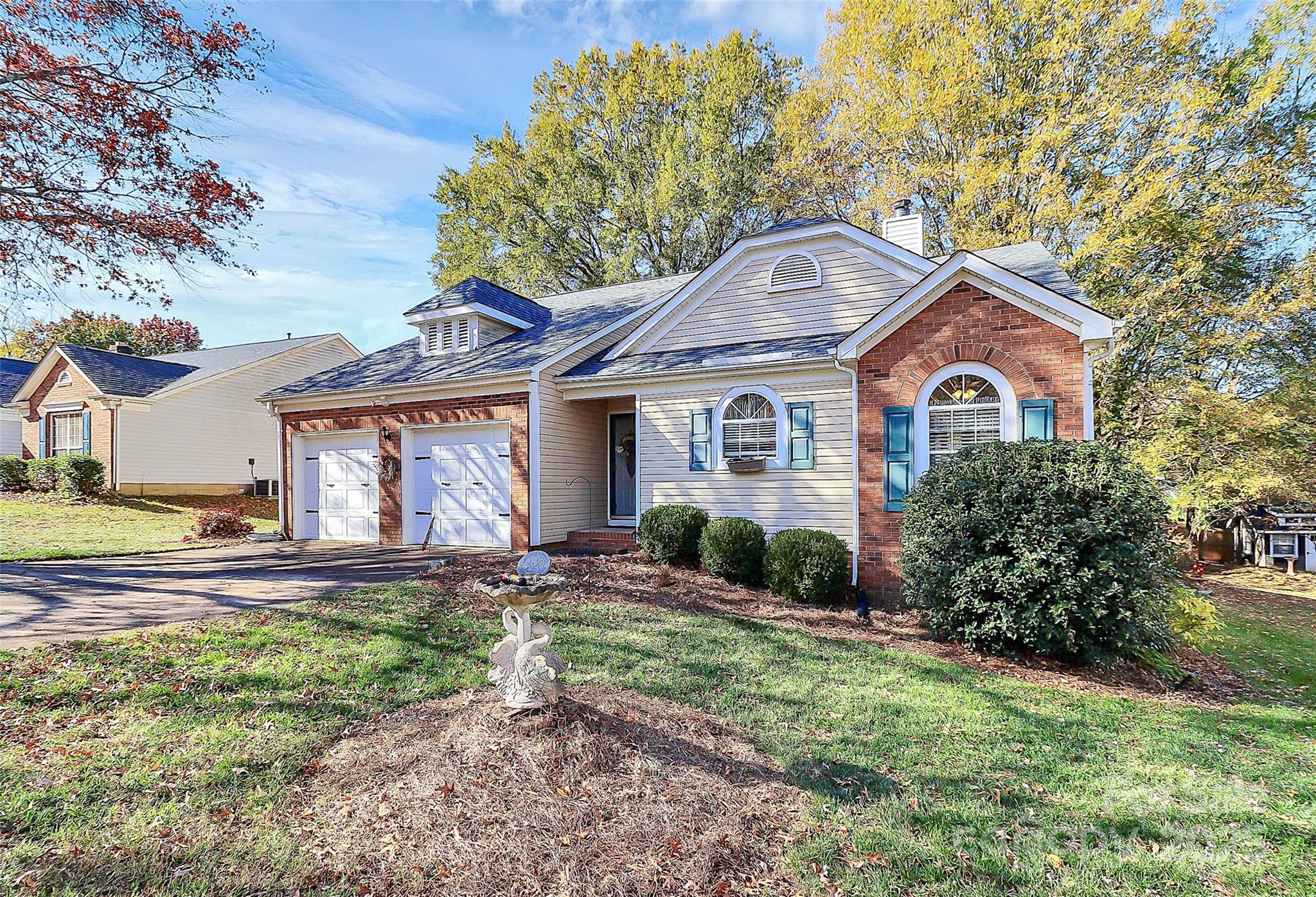 493 Debra Circle Southwest Concord, NC 28025 - Photo 3 of 27 a house view with a garden space