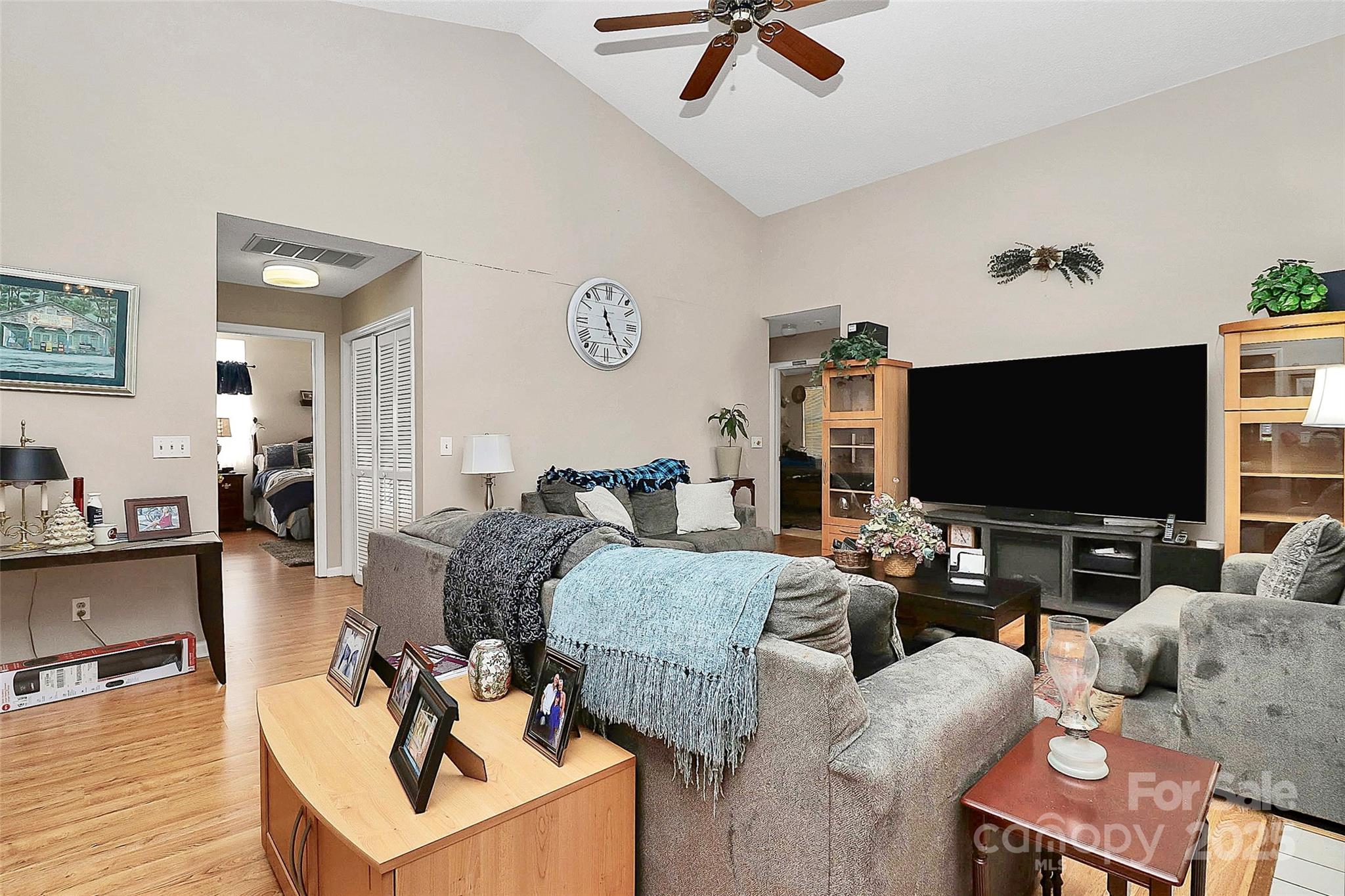 493 Debra Circle Southwest Concord, NC 28025 - Photo 4 of 27 a living room with furniture and a flat screen tv