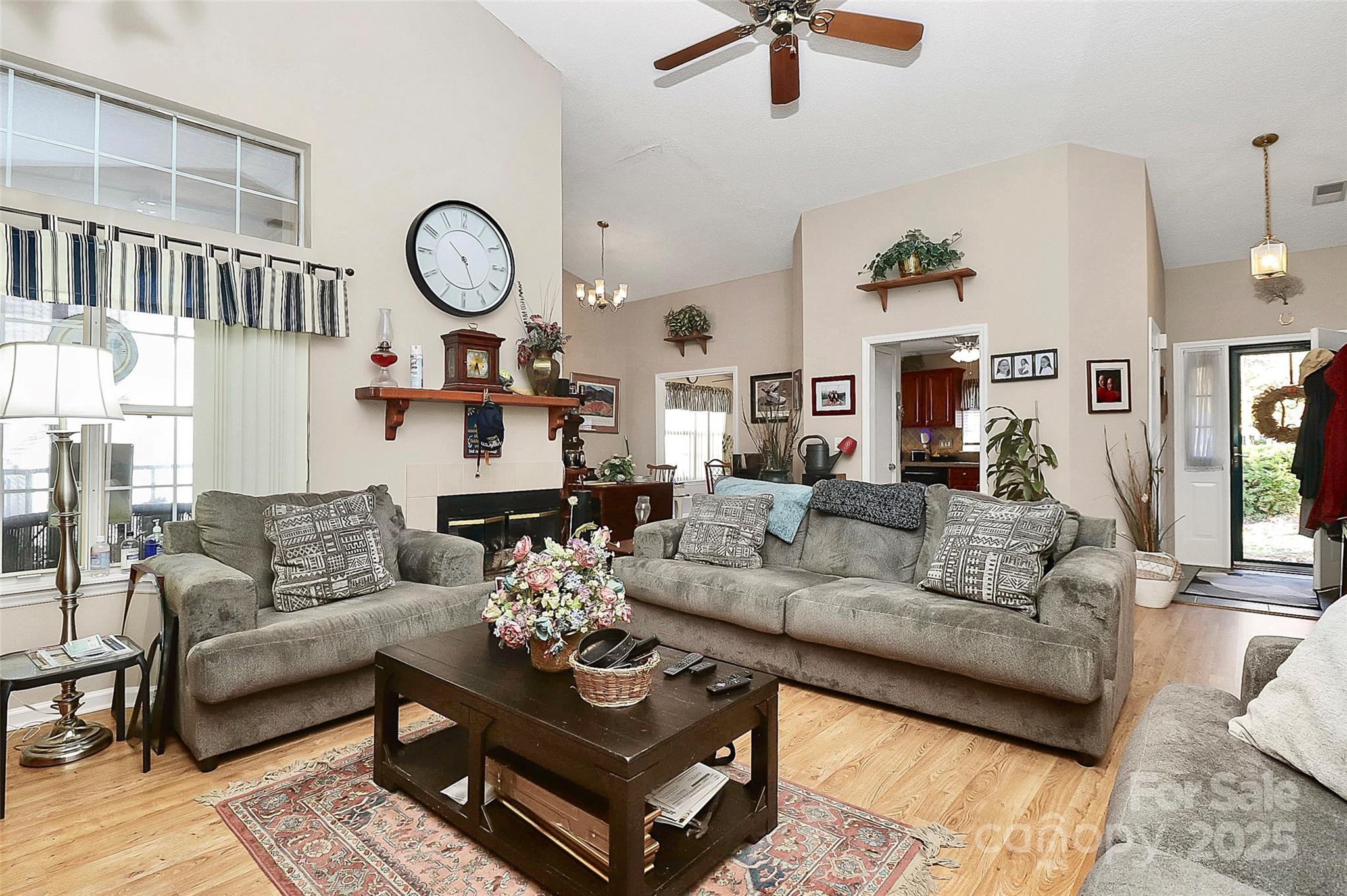 493 Debra Circle Southwest Concord, NC 28025 - Photo 6 of 27 a living room with fireplace furniture and a window