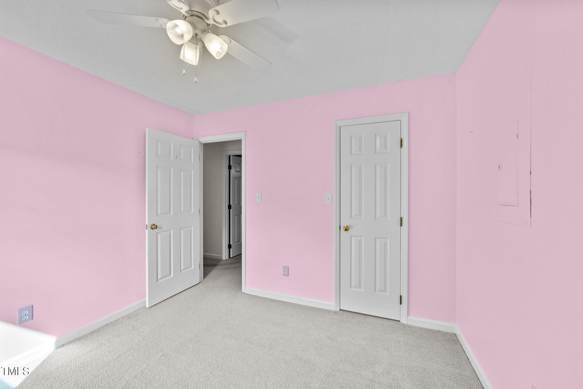 2712 Quail Point Drive Raleigh, NC 27603 - Photo 17 of 25 a view of an empty room with chandelier fan