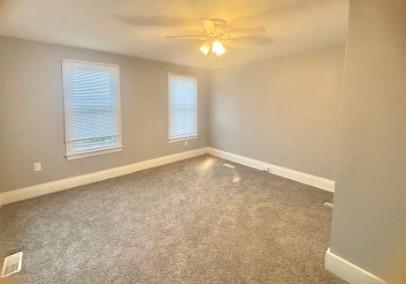 400 Prospect Street, Unit B Jeannette, PA 15644 - Photo 7 of 10 an empty room with windows