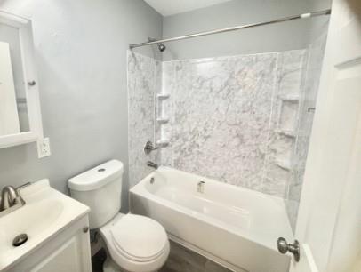 400 Prospect Street, Unit B Jeannette, PA 15644 - Photo 10 of 10 a white bath tub sitting next to a white toilet and sink