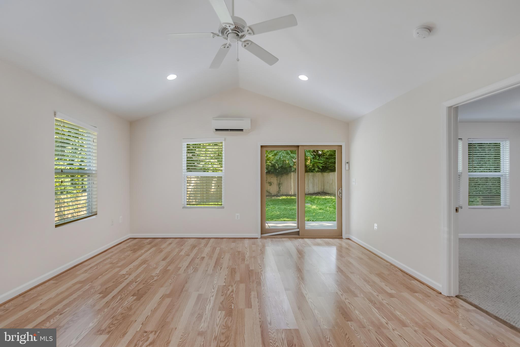 11603 Gail Street Silver Spring, MD 20902 - Photo 9 of 19 wooden floor in an empty room with a window