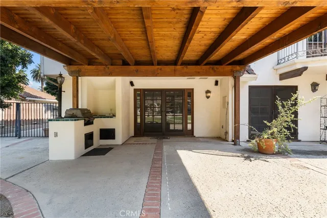 a view of a porch with seating space