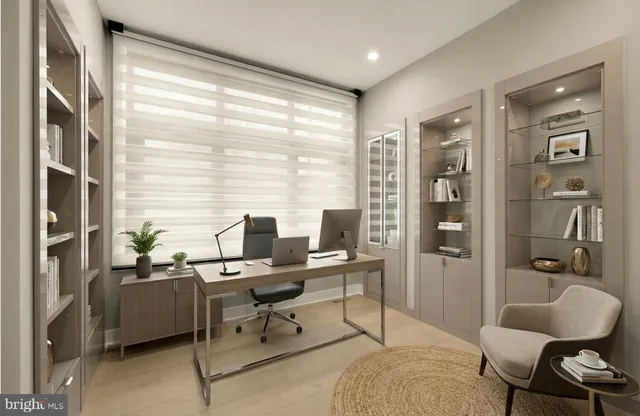 a workspace with furniture and a window