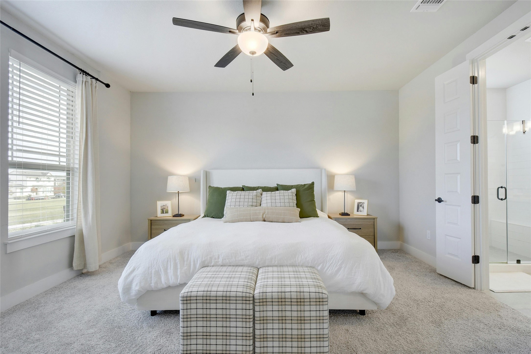 8302 Corrigan Pass Austin, TX 78744 - Photo 14 of 30 Bedroom featuring carpet flooring and a ceiling fan