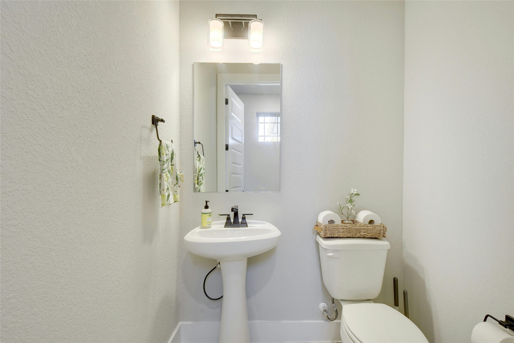 8302 Corrigan Pass Austin, TX 78744 - Photo 19 of 30 Half bathroom with toilet