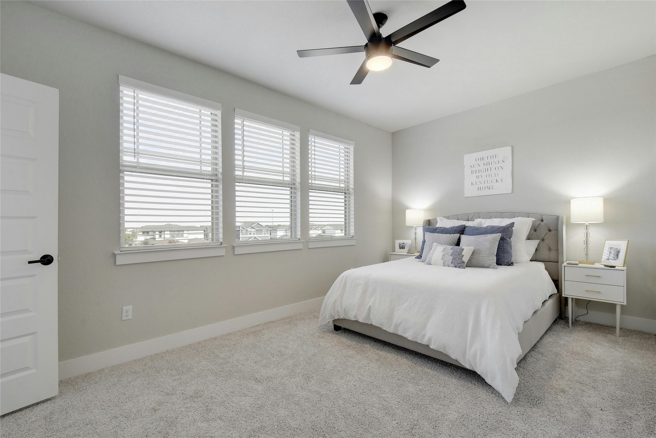 8302 Corrigan Pass Austin, TX 78744 - Photo 21 of 30 Bedroom featuring carpet floors and ceiling fan