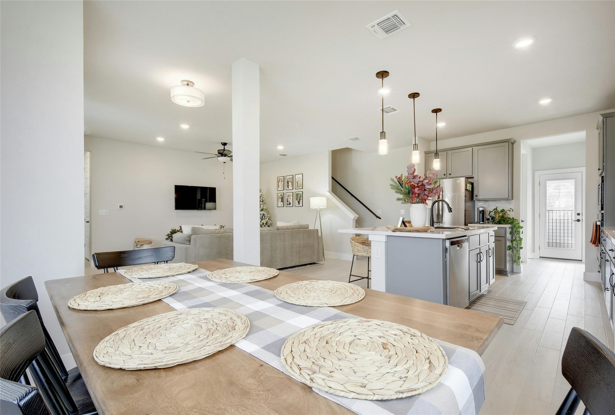 8302 Corrigan Pass Austin, TX 78744 - Photo 8 of 30 Dining space with recessed lighting, a ceiling fan, and light wood-style floors