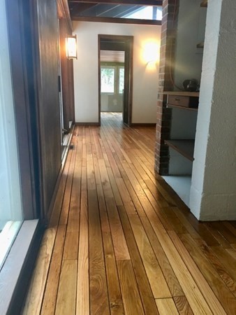 253 Long Plain Road Leverett, MA 01054 - Photo 11 of 42 a view of gallery with wooden floor