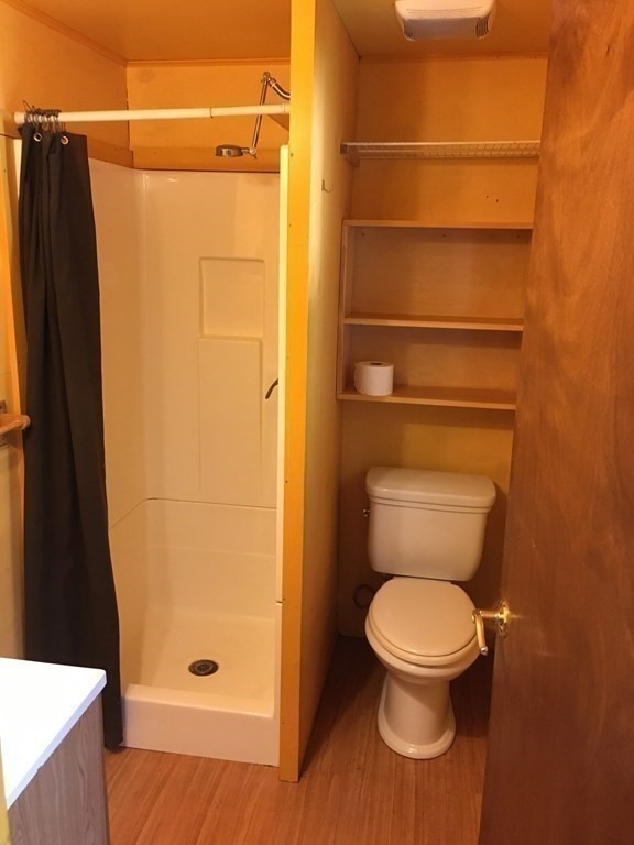 253 Long Plain Road Leverett, MA 01054 - Photo 31 of 42 a bathroom with a toilet and a shower