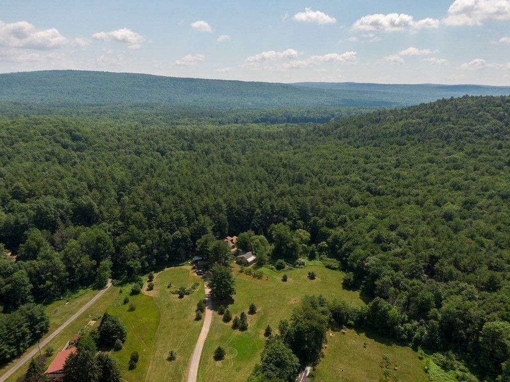 253 Long Plain Road Leverett, MA 01054 - Photo 4 of 42 a view of a city with lots of trees