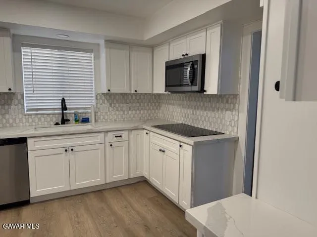 a view of empty room with windows