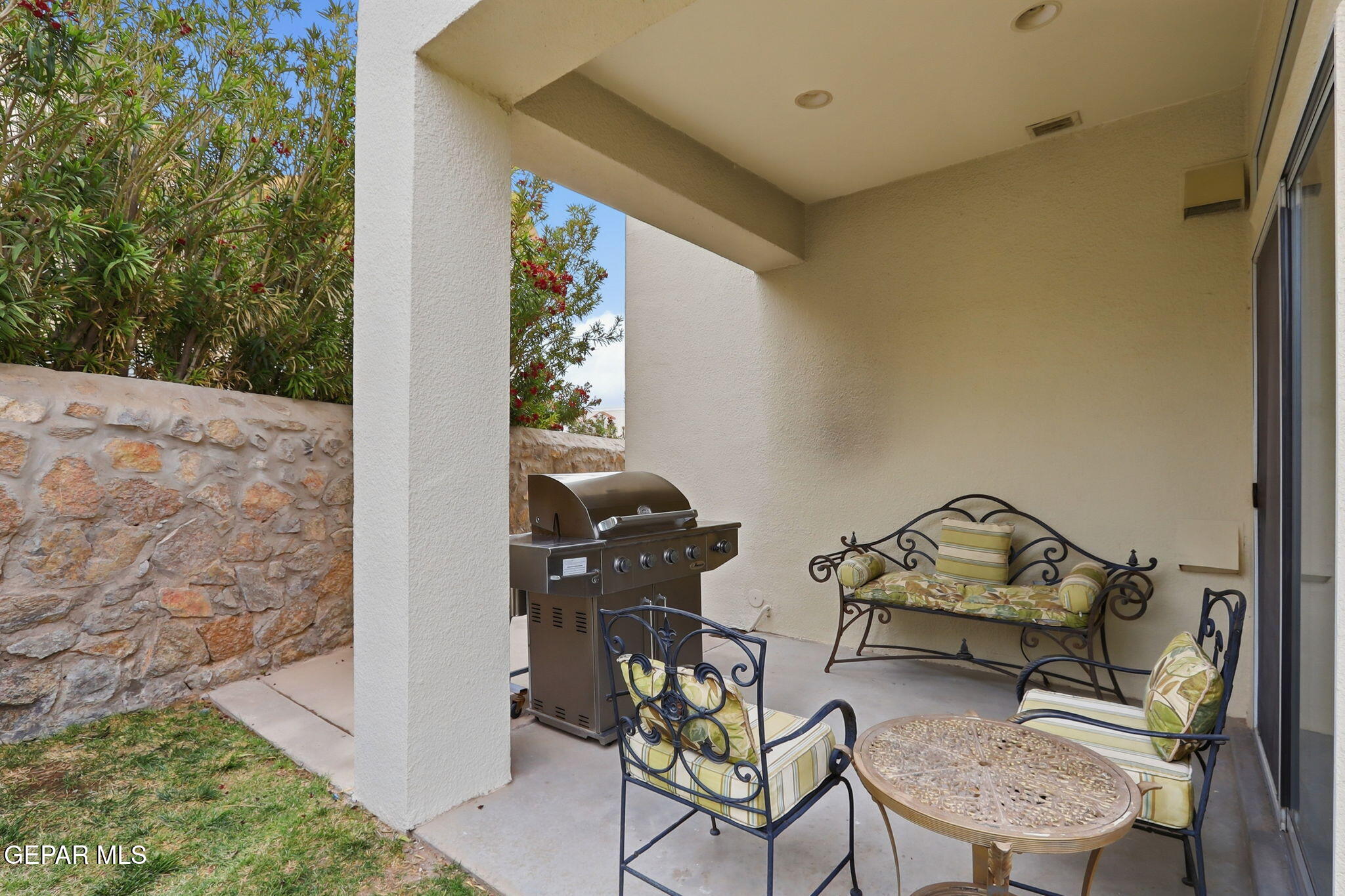 5806 Diamond Point Circle El Paso, TX 79912 - Photo 54 of 61 a living room with furniture and a gate