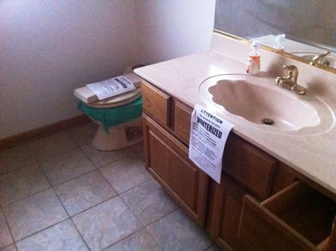 688 Milton Road Inverness, IL 60067 - Photo 11 of 13 a bathroom with a sink and a toilet