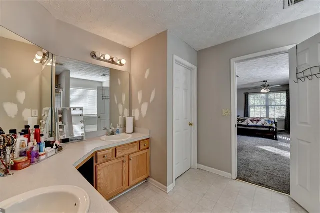 a very nice looking room with a large mirror and cars