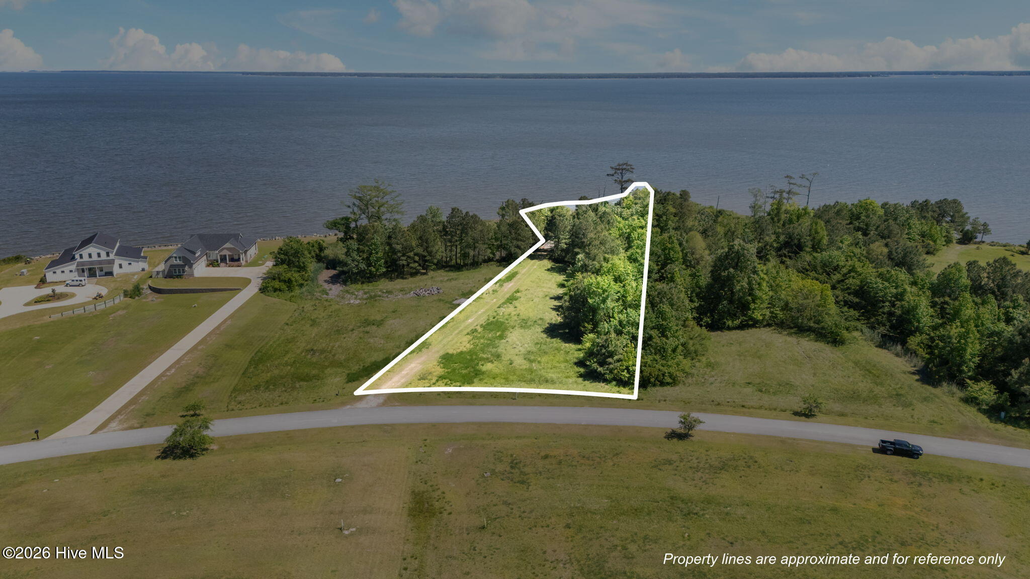 271 Wind Lake Road Oriental, NC 28571 - Photo 1 of 17 1-web-or-mls-DJI_20260421145005_0554_D_1