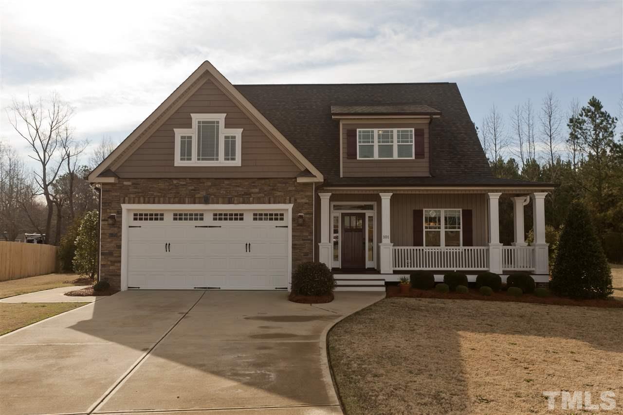 101 South Sunset Ridge Drive Willow Spring, NC 27592 - Photo 1 of 25 a view of a house with a yard