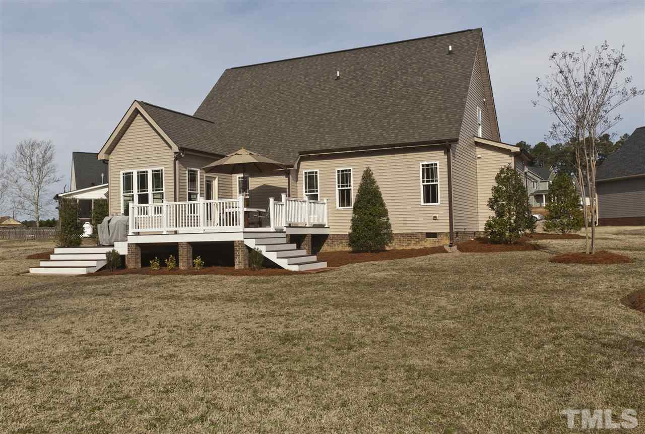 101 South Sunset Ridge Drive Willow Spring, NC 27592 - Photo 25 of 25 a front view of a house with a yard