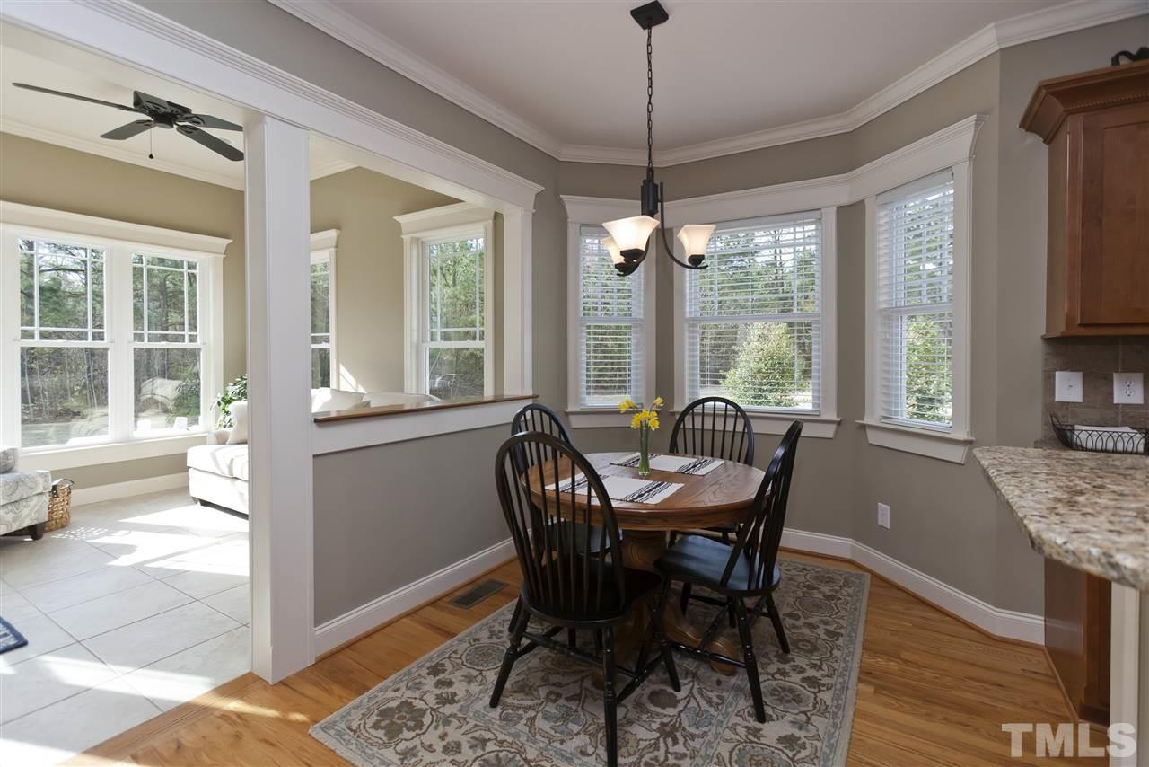 101 South Sunset Ridge Drive Willow Spring, NC 27592 - Photo 8 of 25 a view of a dining room with furniture window and outside view