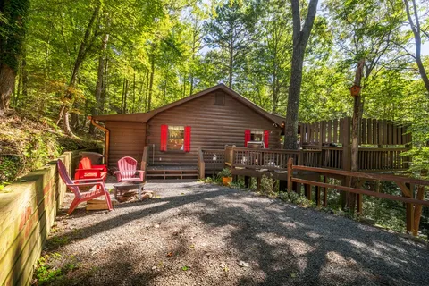 a view of a two chairs in the patio