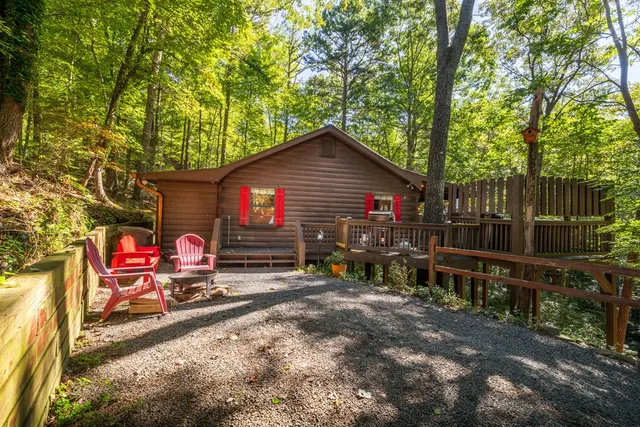 a view of a two chairs in the patio