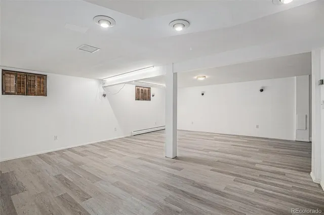 a view of a livingroom with wooden floor