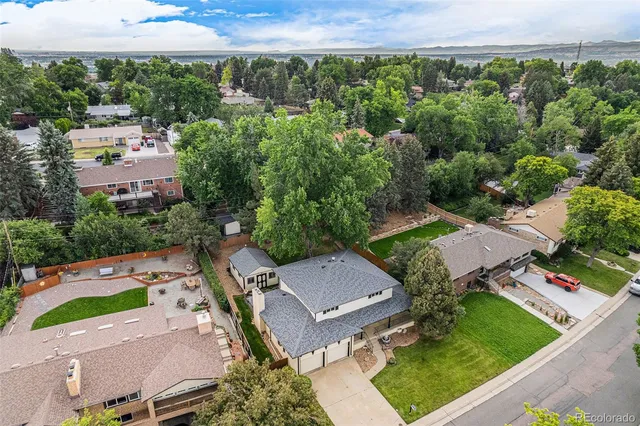 an aerial view of a house with a garden