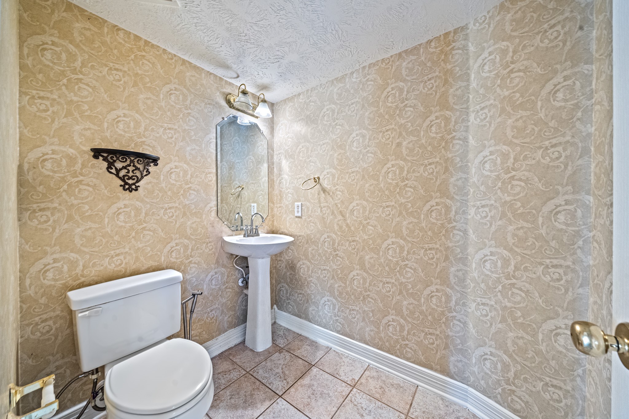 9306 Lochflora Drive Spring, TX 77379 - Photo 17 of 48 a white toilet sitting next to a shower