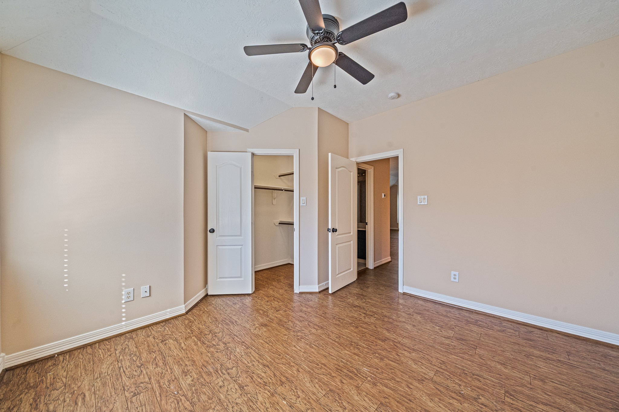 9306 Lochflora Drive Spring, TX 77379 - Photo 33 of 48 a view of empty room with wooden floor
