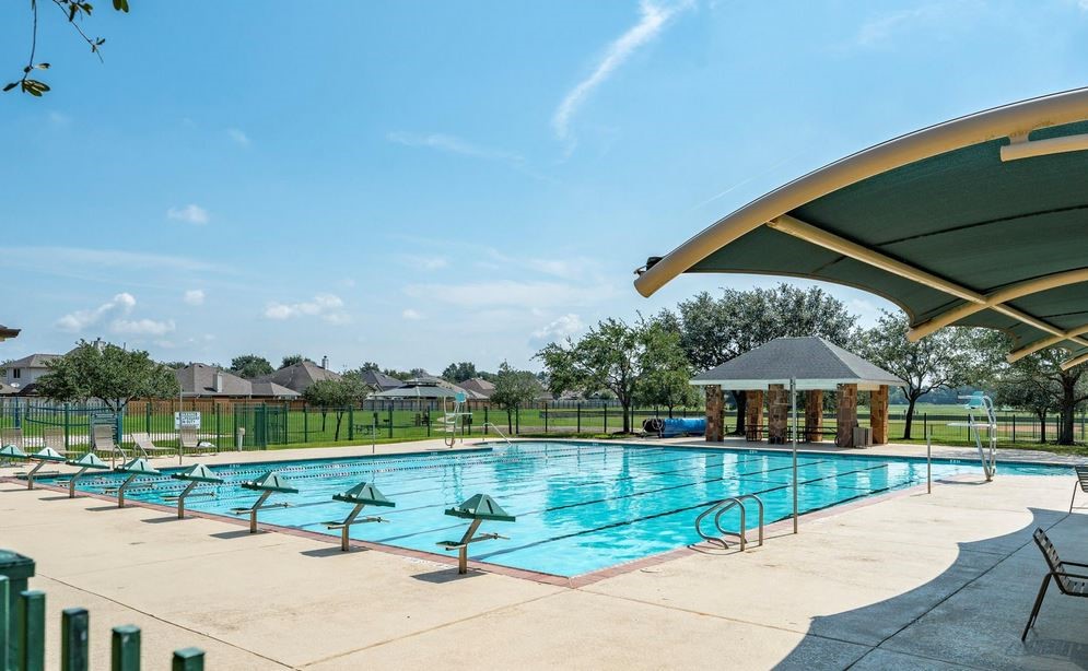 9306 Lochflora Drive Spring, TX 77379 - Photo 41 of 48 a view of swimming pool with a patio and a yard