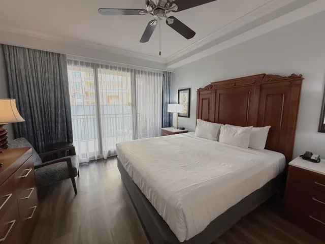 a bedroom with bed and window