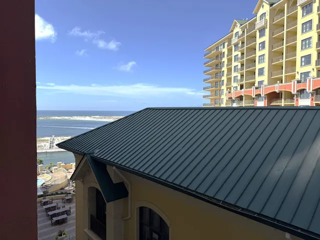 a view of a balcony with an ocean view