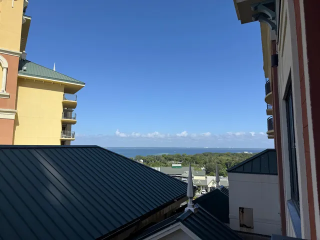 a view of balcony with furniture