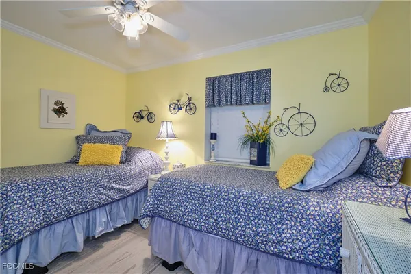 a bedroom with a bed and dresser