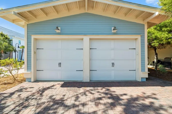 an aerial view of a house with a garden space
