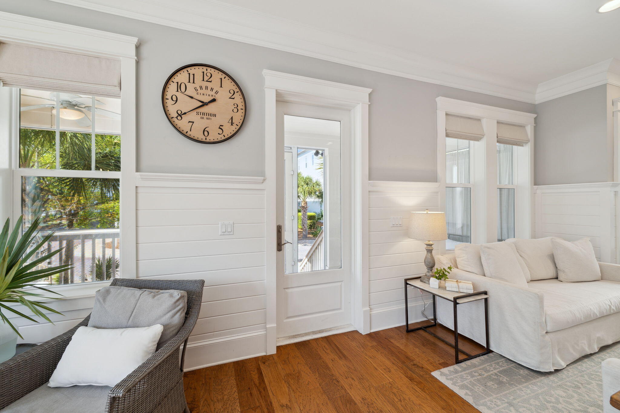 89 Clipper Street Inlet Beach, FL 32461 - Photo 22 of 72 a living room with furniture a window and a clock