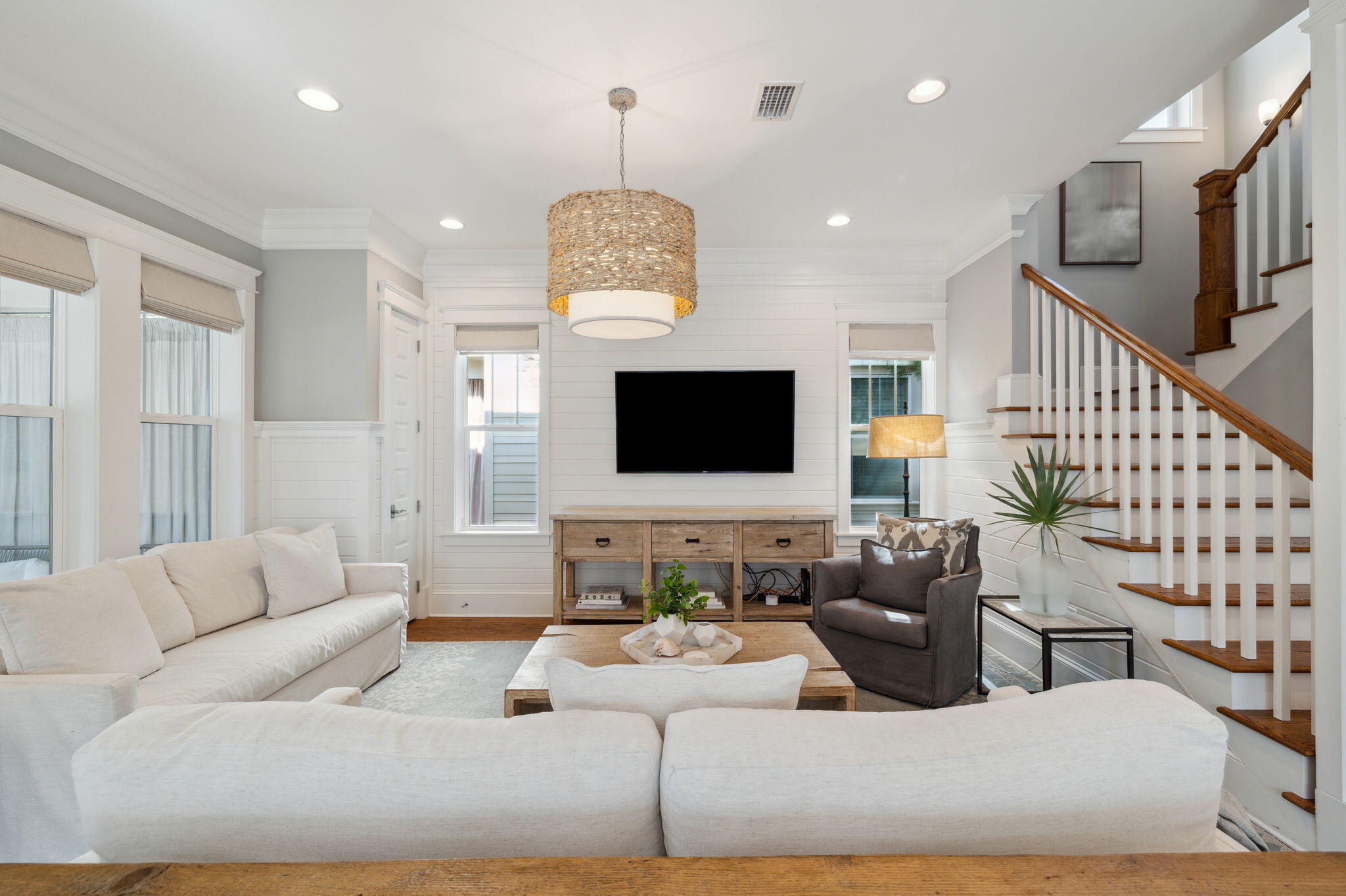 89 Clipper Street Inlet Beach, FL 32461 - Photo 23 of 72 a living room with furniture kitchen view and a flat screen tv