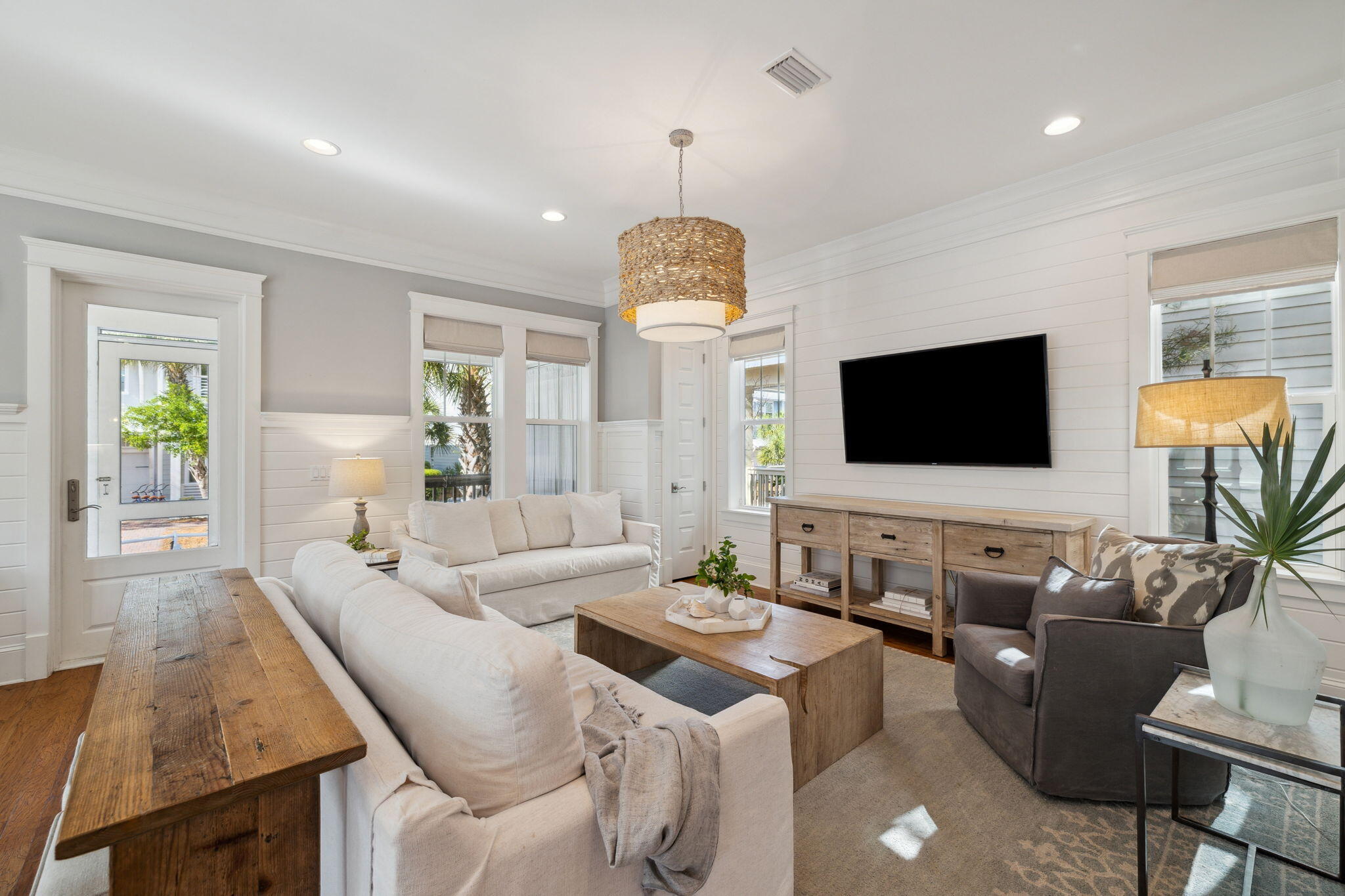 89 Clipper Street Inlet Beach, FL 32461 - Photo 24 of 72 a living room with furniture fireplace and a flat screen tv