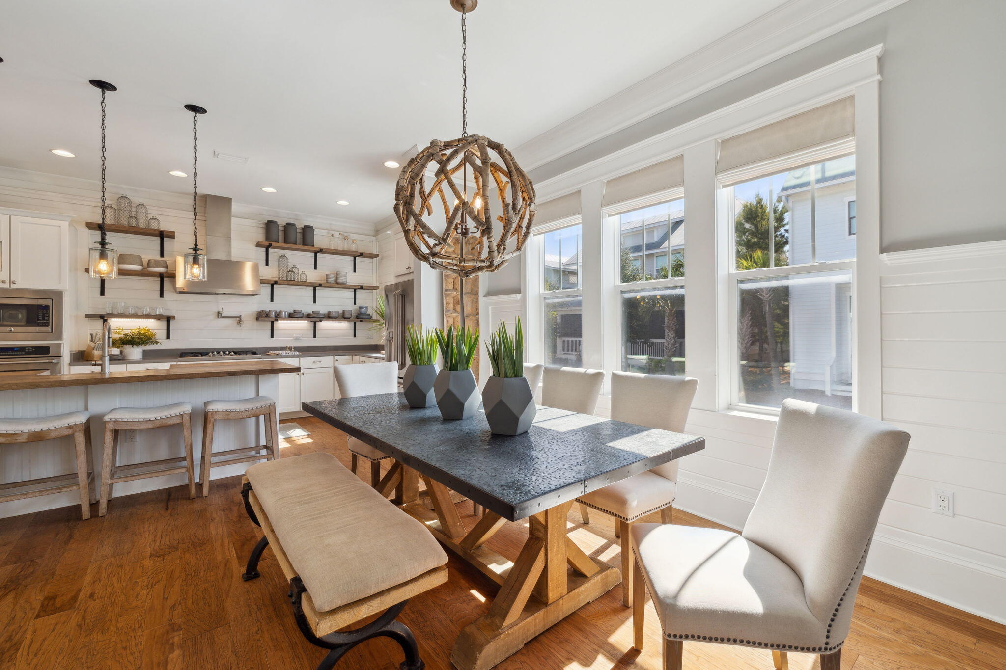 89 Clipper Street Inlet Beach, FL 32461 - Photo 37 of 72 a view of a dining room with furniture wooden floor and chandelier